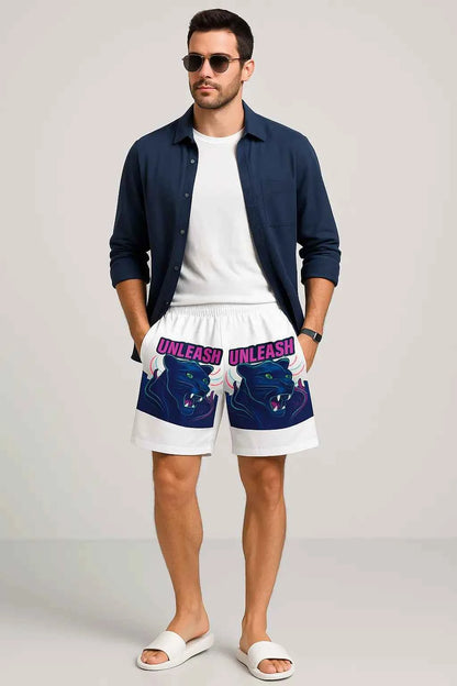 Panther graphic swim shorts worn by model at sunny poolside
