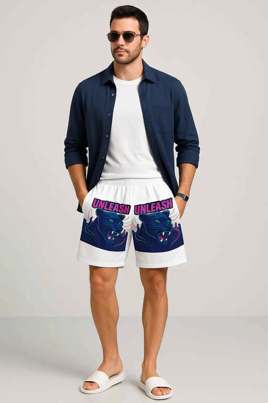 Panther graphic swim shorts worn by model at sunny poolside
