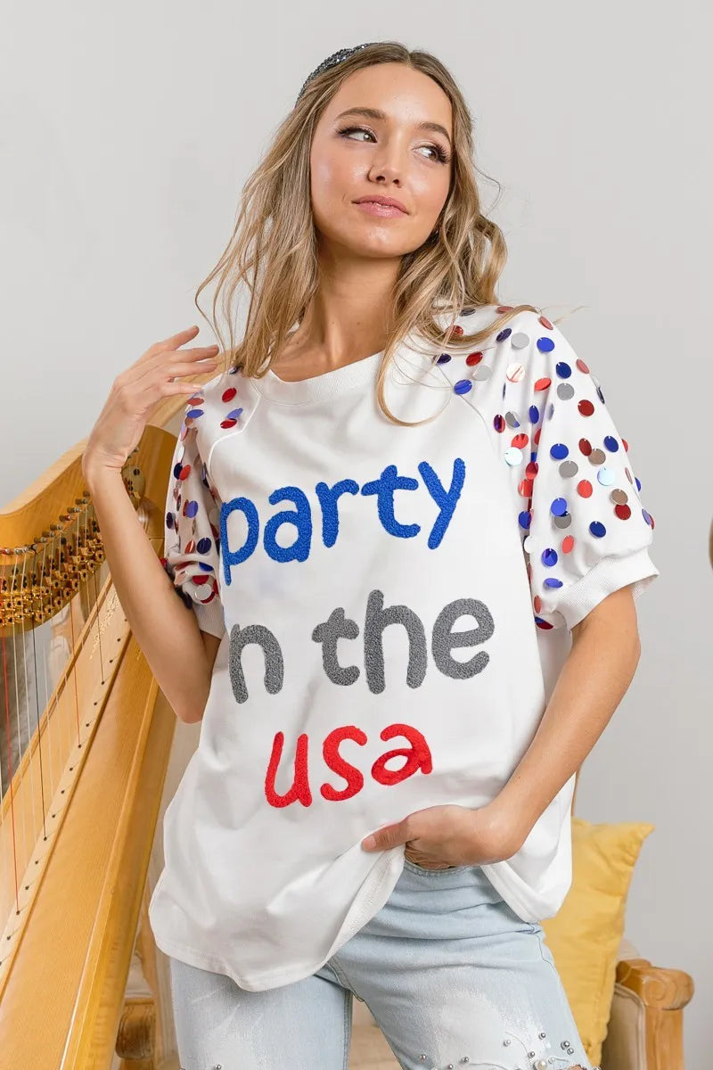 Party In The USA Top – flat lay showing fabric, tag, and sleeve shape