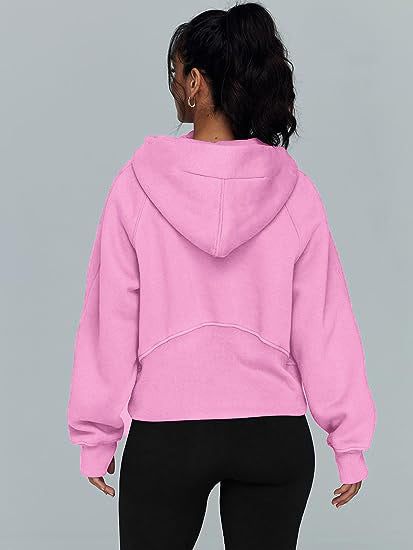Pink pullover hoodie with zip, ideal for stylish lounging


