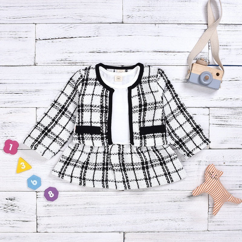 Plaid perfection in a two-piece knit set that pairs effortlessly with jackets and accessories.

