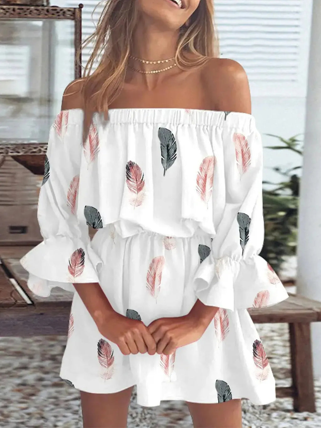 Detail of hemline movement in plus size off-shoulder flounce sleeve dress

