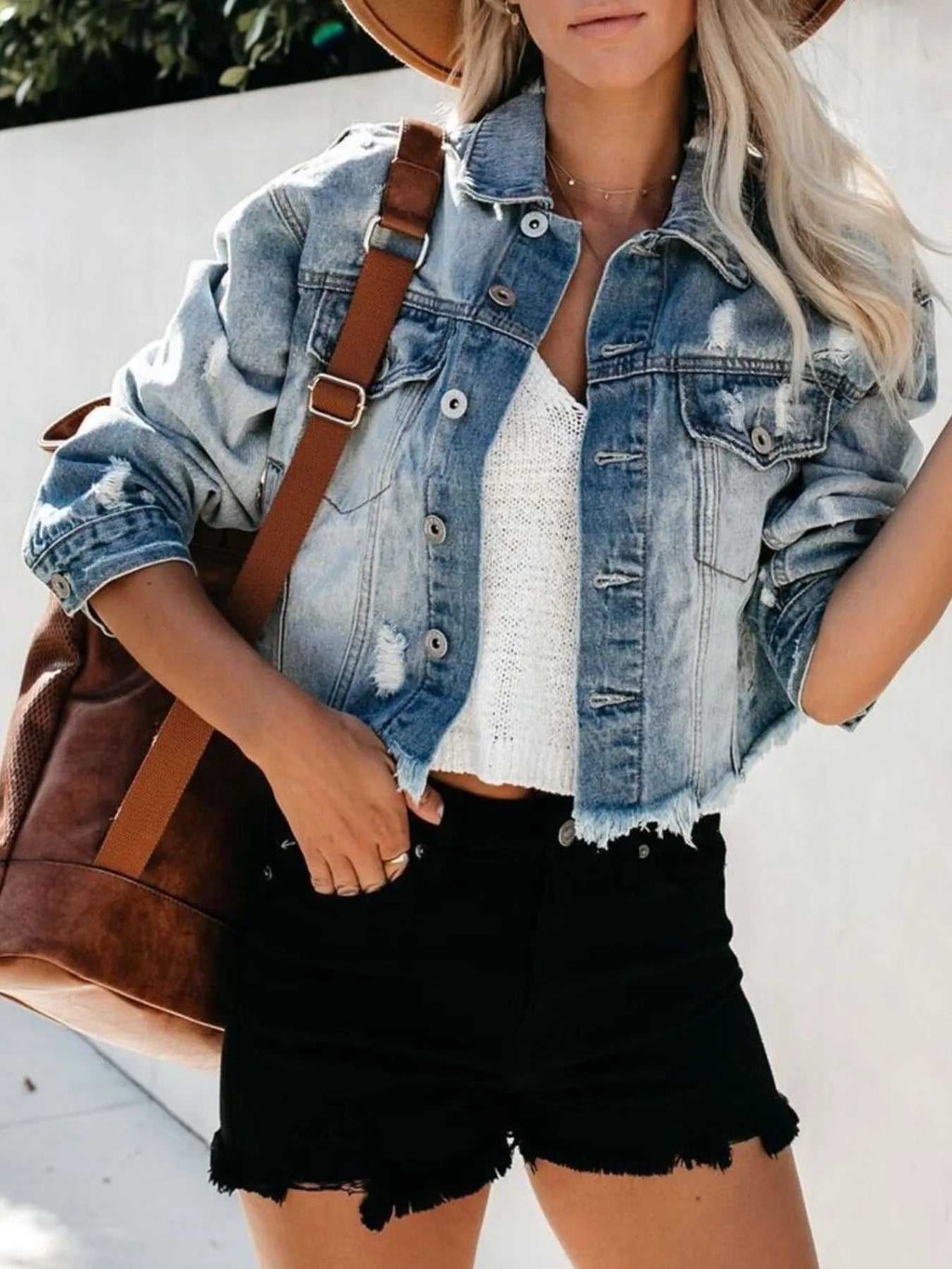Pocketed light blue women's jacket in streetwear setting

