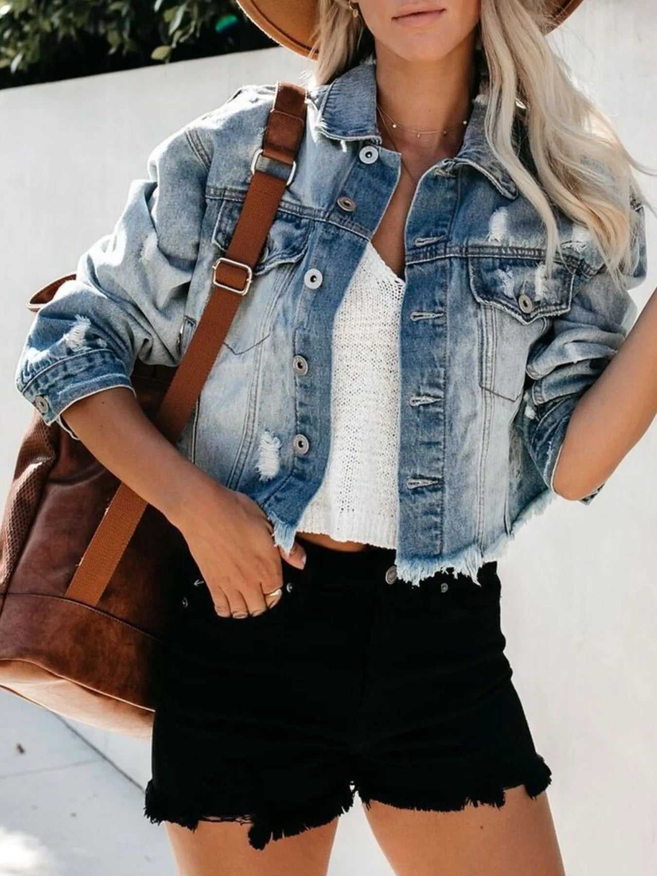 Pocketed light blue women's jacket in streetwear setting

