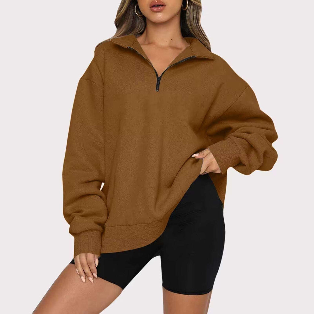 Red women's zip collar sweatshirt with long sleeves, folded flat to reveal smooth polyester fabric

