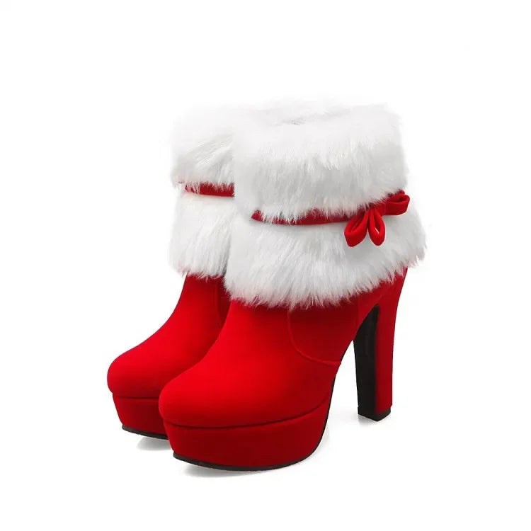 Red boots displayed on white background with fluffy white cuffs, matching bow straps, round toes, platforms, and block heels.