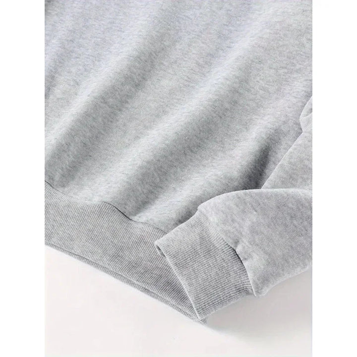 Polyester blend casual sweatshirt London print close-up fabric texture slight stretch