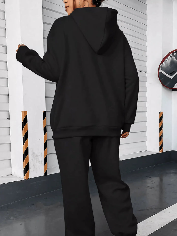 queen hoodie jogger set matching top and pants in cream with bold Queen logo for gym warmups and daily errands
