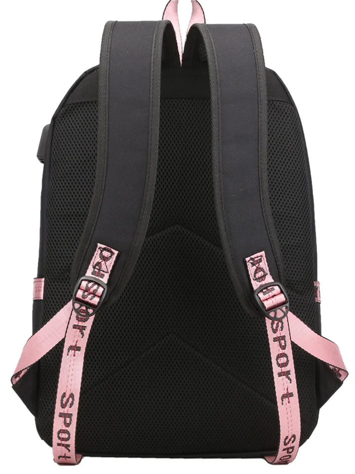 Back of black school backpack, showing two shoulder straps, mesh panels, pink adjustment webbing and top handle in the photo.