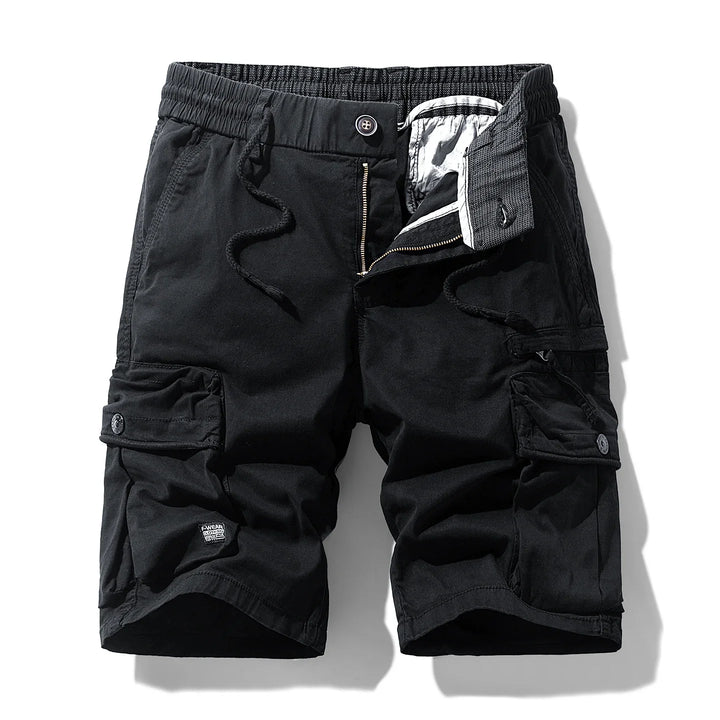 Original front view of black cargo shorts with drawcords and buttoned thigh pockets.