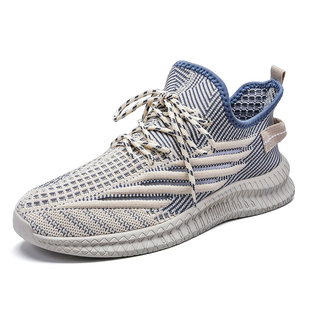 Beige mesh sneaker shown alone at a three-quarter angle on white, with laces and a ribbed sole in the supplied product photo.