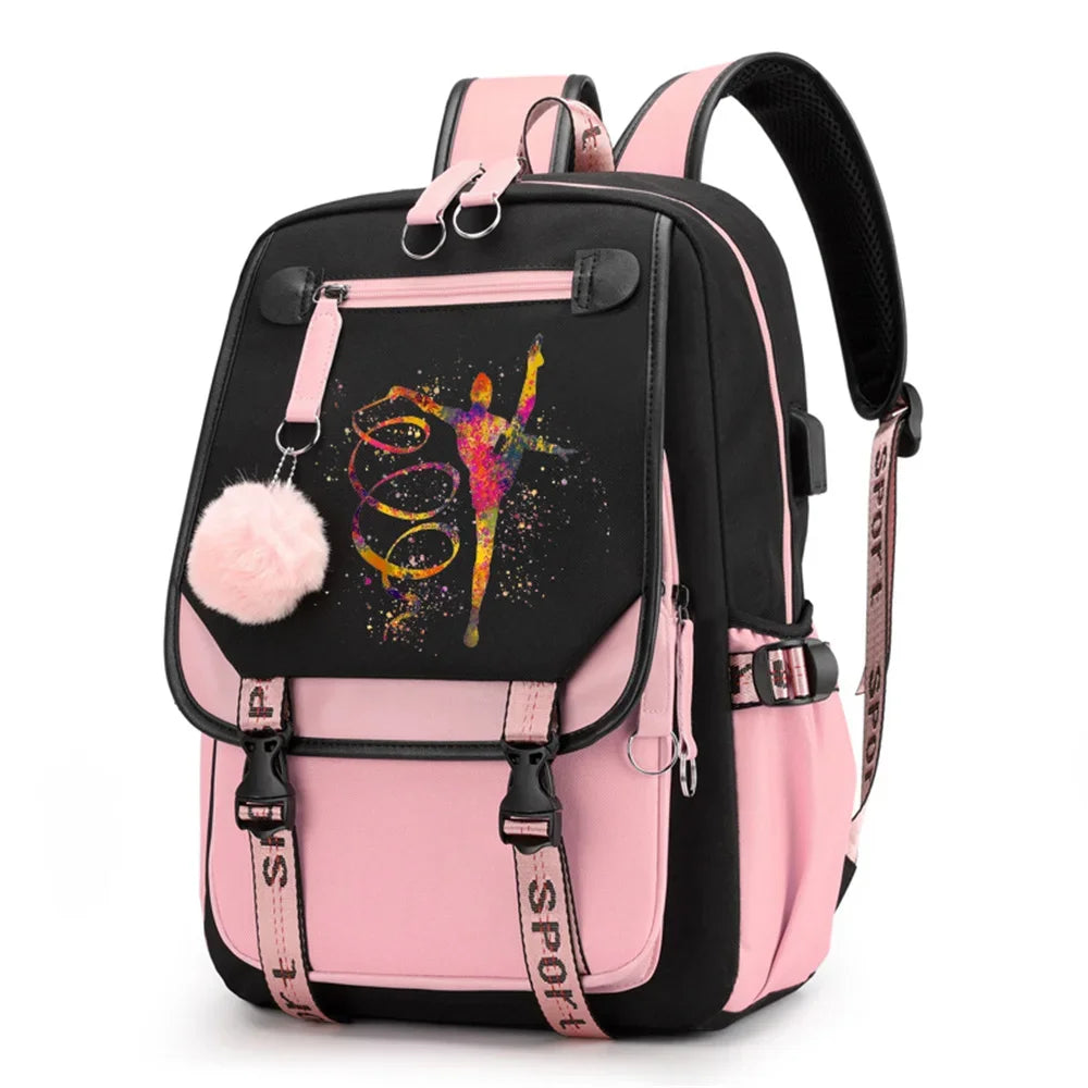 Pink and black backpack in design 1D-35-1 with a colorful gymnast print, buckle straps and pink pendant, shown against white.