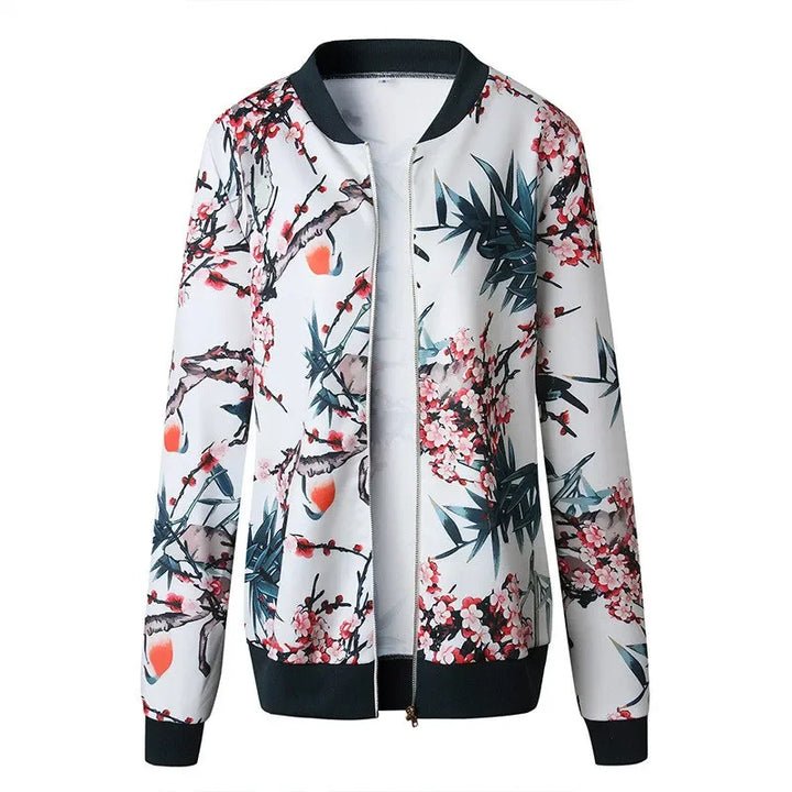 Botanical printed jacket with black ribbed collar, cuffs and hem, shown from the front on a seamless white studio background.
