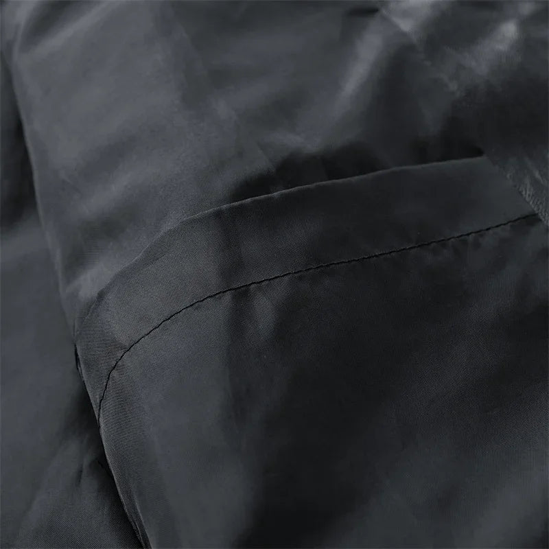 Close-up of seam on the black jacket interior