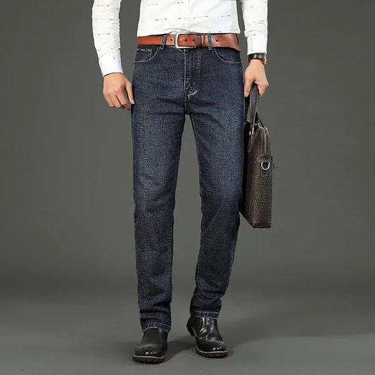 "business casual men's jeans dark blue stretch denim styled with shirt and blazer for work meeting"