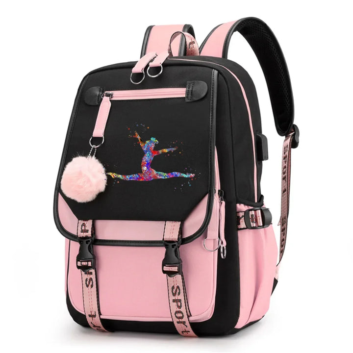 Pink and black backpack in design 1D-35-9 with a colorful gymnast print, buckle straps and pink pendant, shown against white.