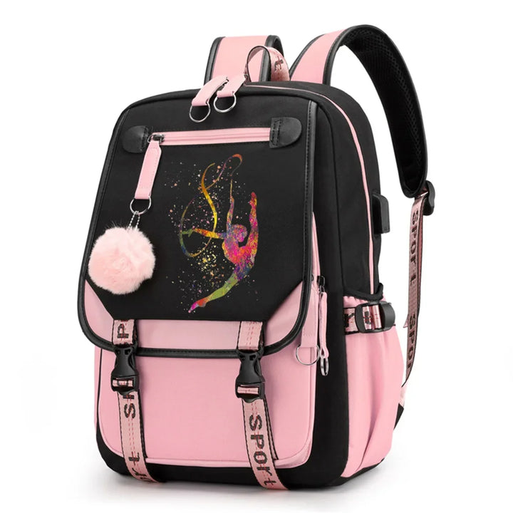 Pink and black backpack in design 1D-35-5 with a colorful gymnast print, buckle straps and pink pendant, shown against white.