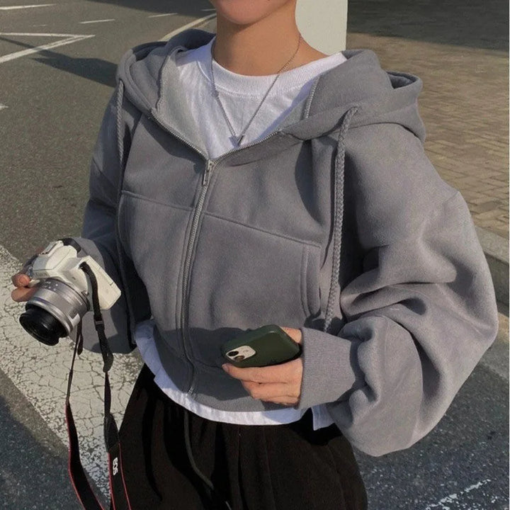 Dark grey cropped full zip hoodie shown on a model, with original visual details, retained from the original product gallery.