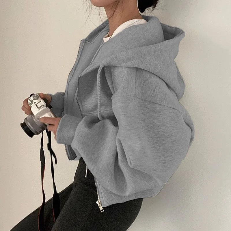 Light grey cropped full zip hoodie shown on a model, with original details, retained as an original supplier reference image.