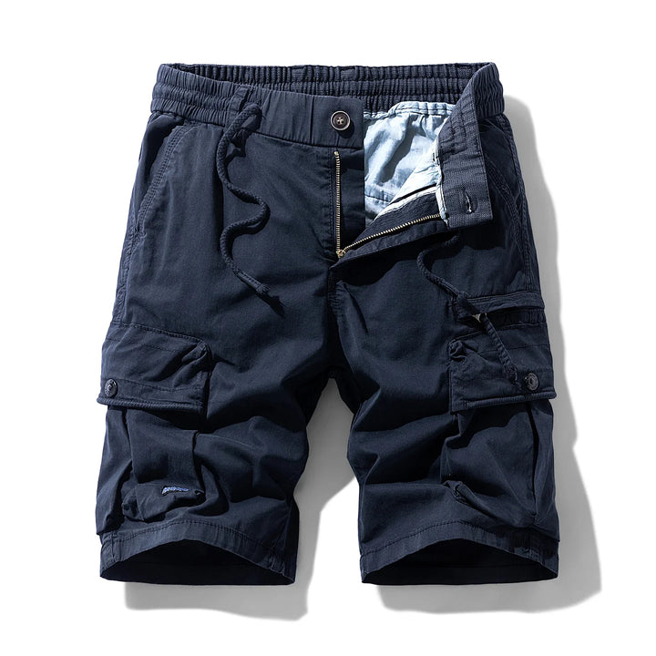 Original front view of dark blue cargo shorts with drawcords and buttoned thigh pockets.