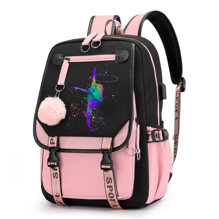 Pink and black backpack in design 1D-35-12 with a colorful gymnast print, buckle straps and pink pendant, shown against white