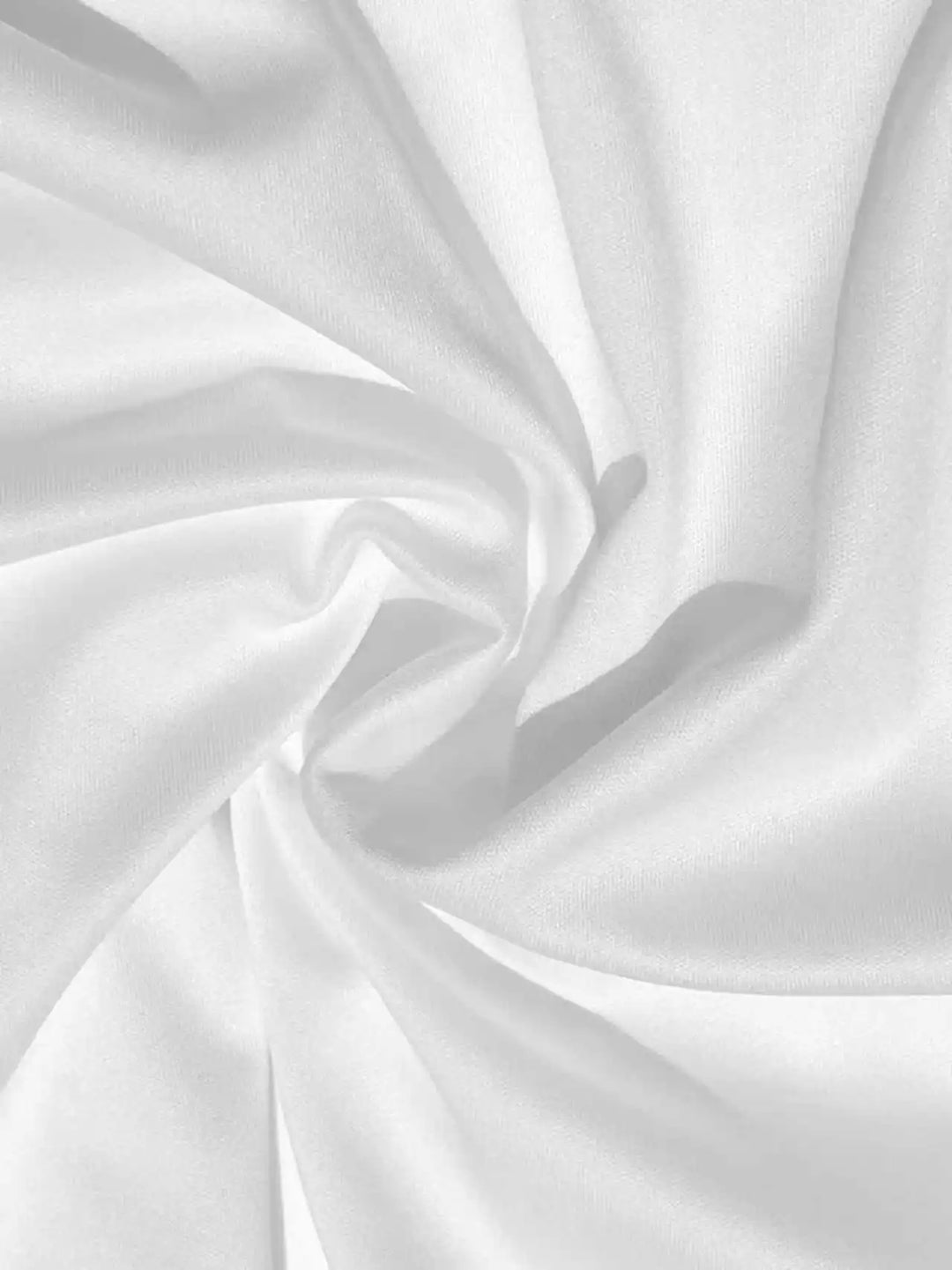 Close-up of white fabric with folds