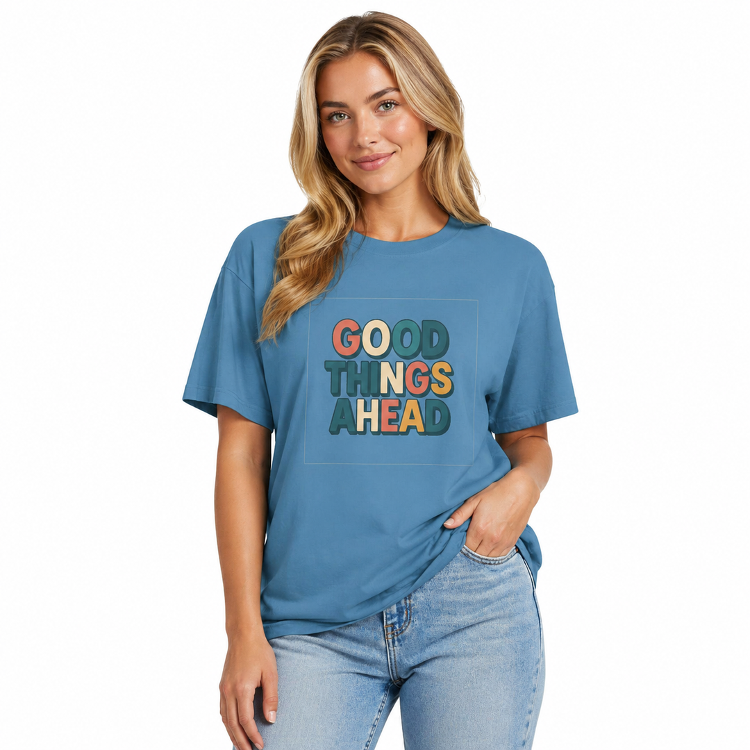 Woman wearing a blue t-shirt with &