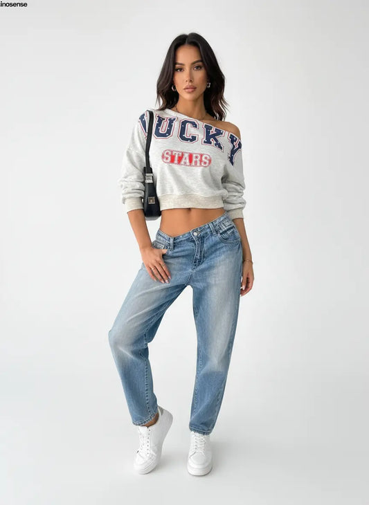 "off shoulder crop sweatshirt model wearing casual autumn outfit"


