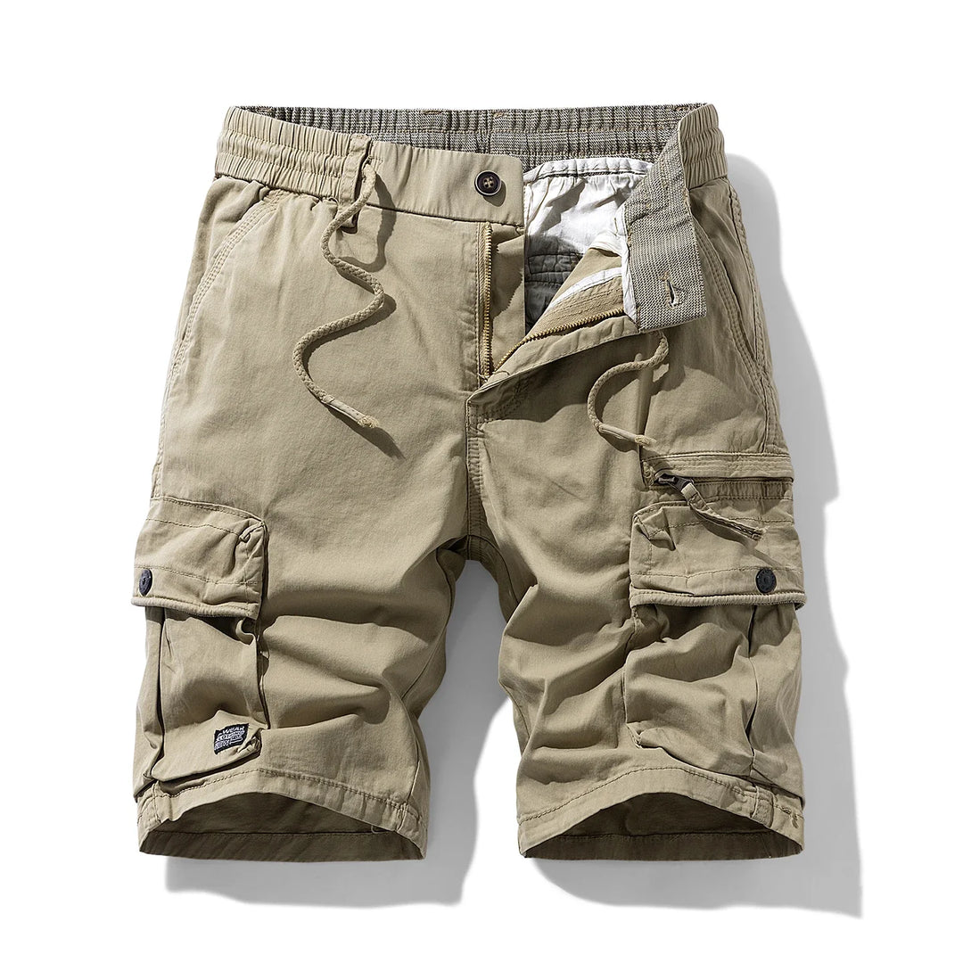 Original front view of khaki cargo shorts with drawcords and buttoned thigh pockets.