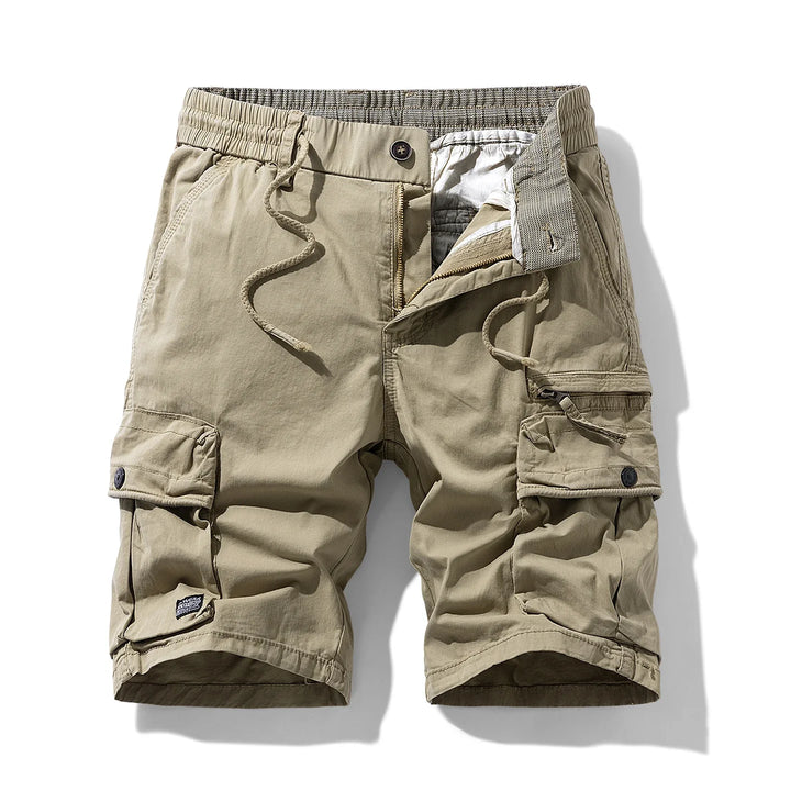 Original front view of khaki cargo shorts with drawcords and buttoned thigh pockets.