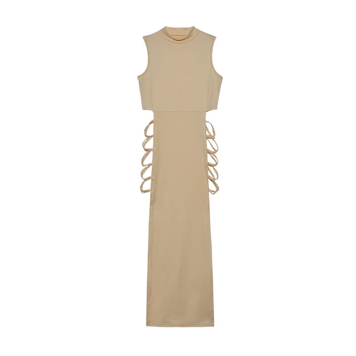 Maxi dress product image showing the long solid-color silhouette, high neckline and distinctive criss cross side details view