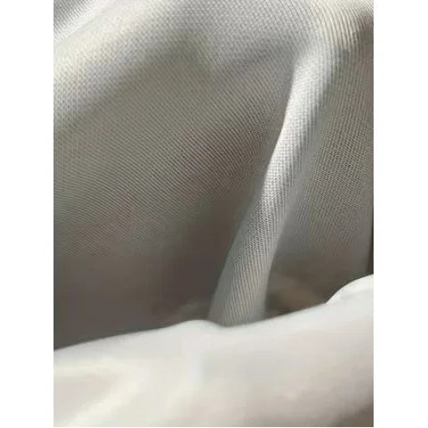 Close view of the supplied light-colored fabric texture