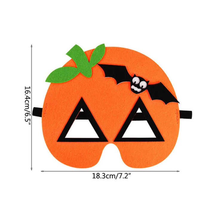 Orange pumpkin mask with black bat detail; the source measurements show width 18.3 cm or 7.2 in and height 16.4 cm or 6.5 in.