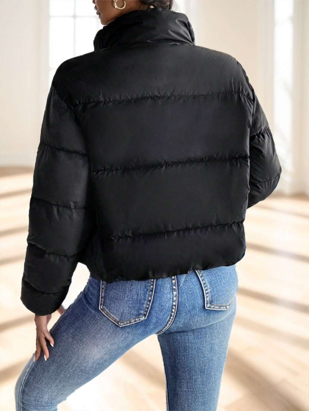 Back view of reversible polyester puffer for cold weather

