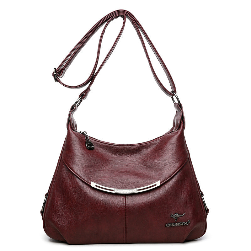 Side Profile of Soft Leather Shoulder Bag – Women's Fashionable Shell Shape with Subtle Sewing Details