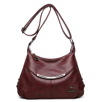Side Profile of Soft Leather Shoulder Bag – Women's Fashionable Shell Shape with Subtle Sewing Details