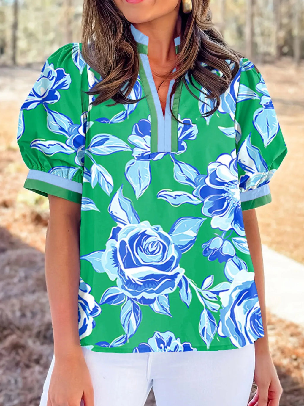 Side profile of blouse highlighting sleeve volume

