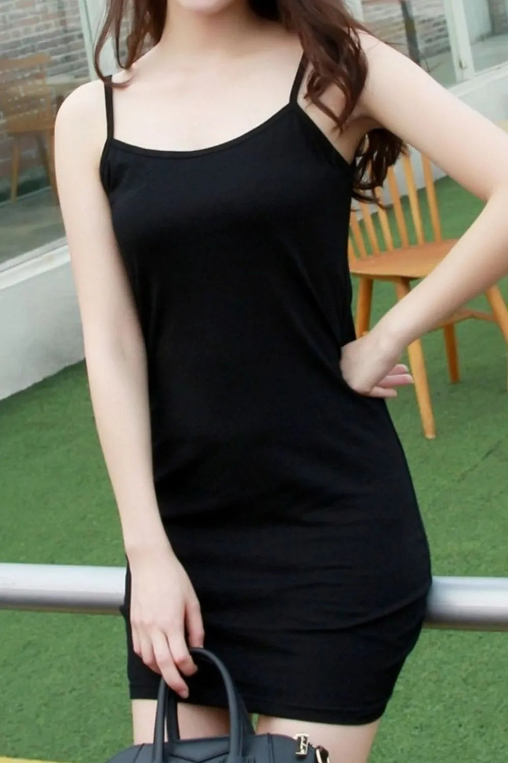 Side view of scoop neckline on fitted summer mini cami dress

