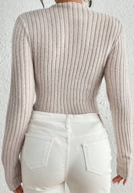 Side view of slim-fit long sleeve jumpsuit for women

