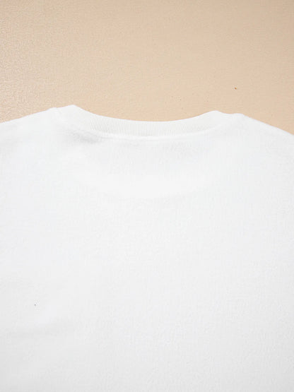 Soft and slightly stretchy top with exposed seam accents

