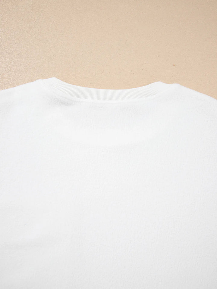 Soft and slightly stretchy top with exposed seam accents

