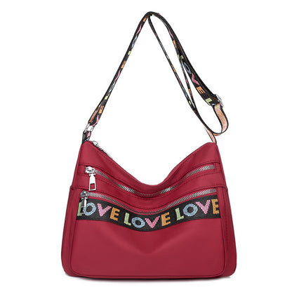Stylish Red Oxford Cloth Crossbody Bag: Multi-Pocket Layout for Organized Travel