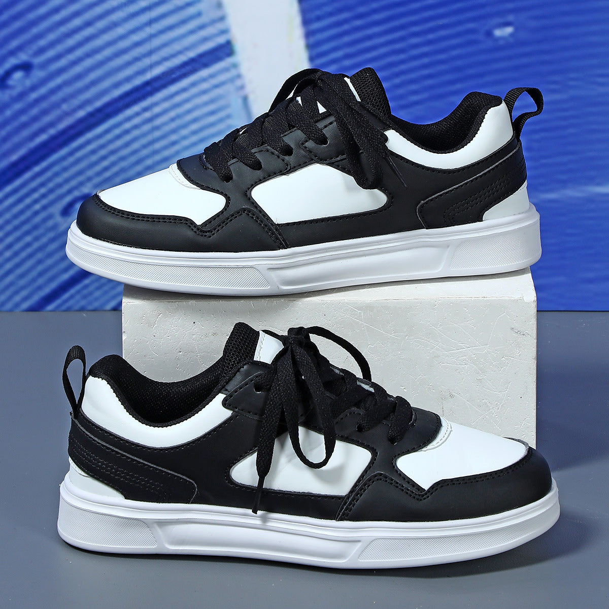 Stylish couple sneakers with thick sole and lace-up design

