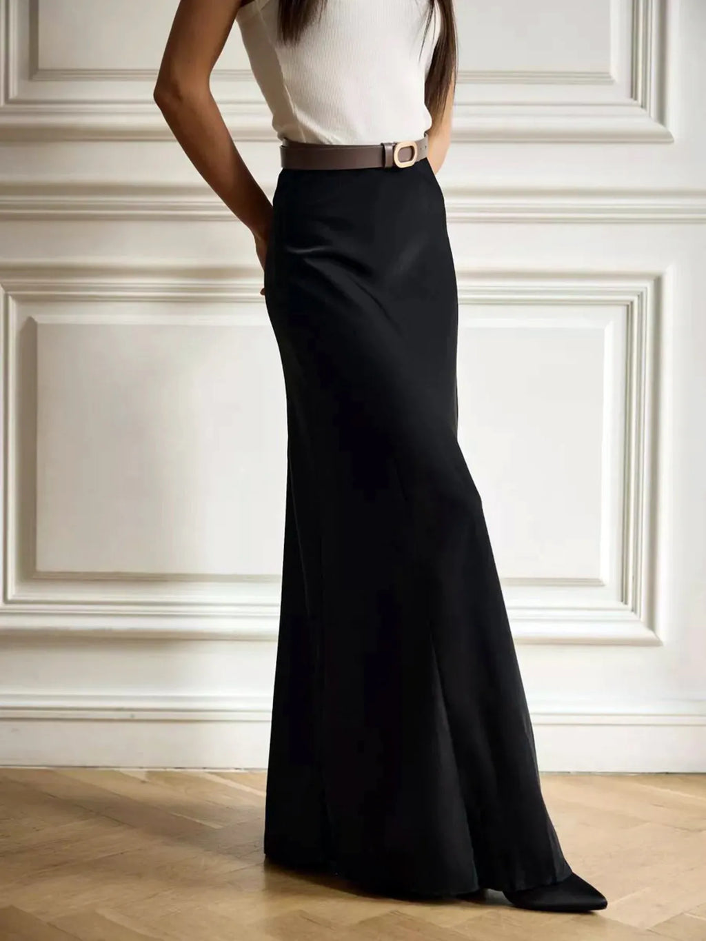 Street-style look: high-waisted maxi skirt paired with a crop top and sneakers for urban flair.

