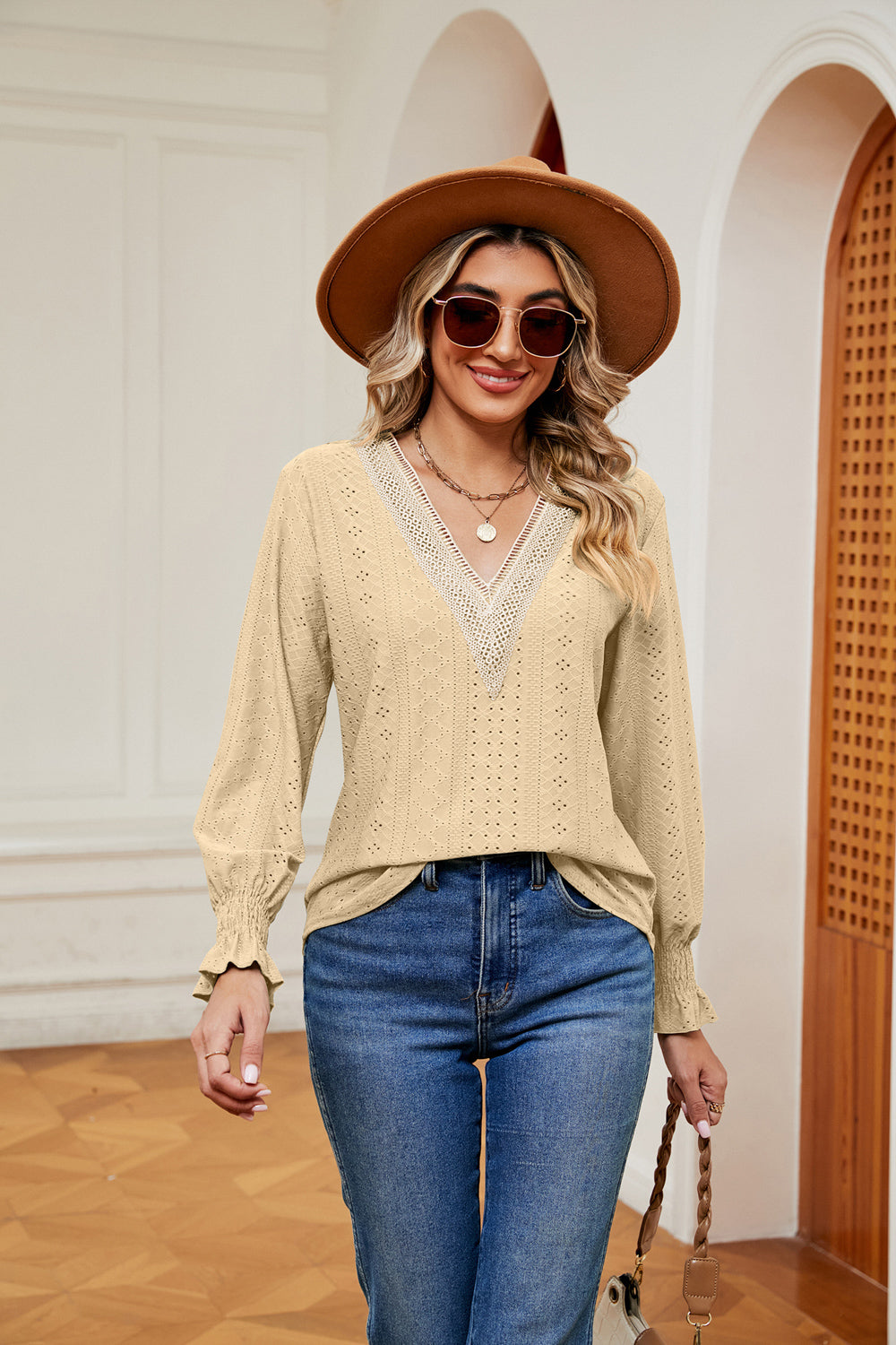 Transition seamlessly from desk to dinner in the Contrast Flounce Sleeve Blouse.


