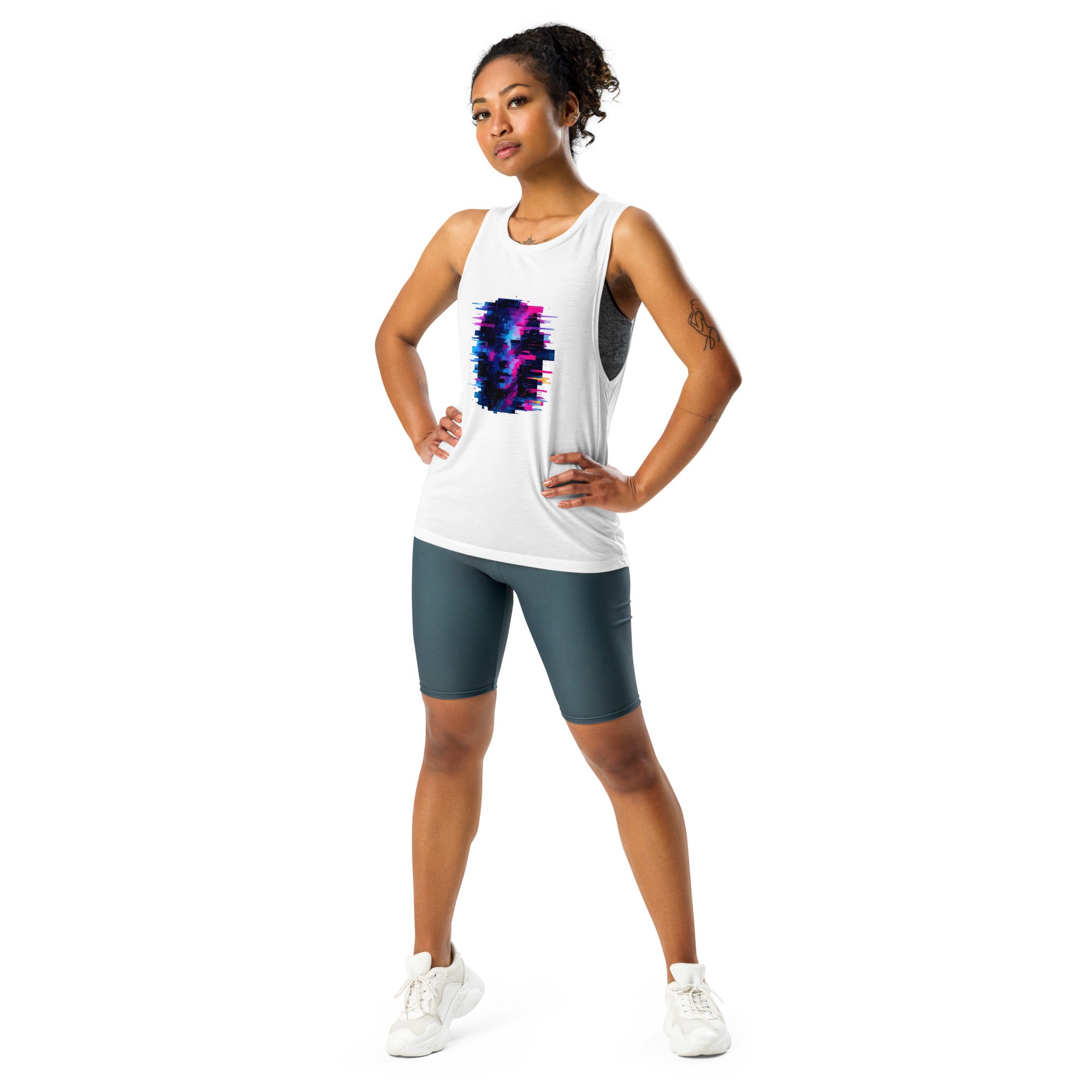 Two smiling women in glitch-art ladies’ muscle tanks heather gray with black leggings, white with denim shorts posed against a neutral studio backdrop.