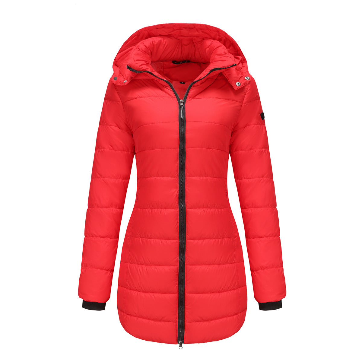 Urban commuter in red waterproof cotton-padded jacket walking down wet city sidewalks

