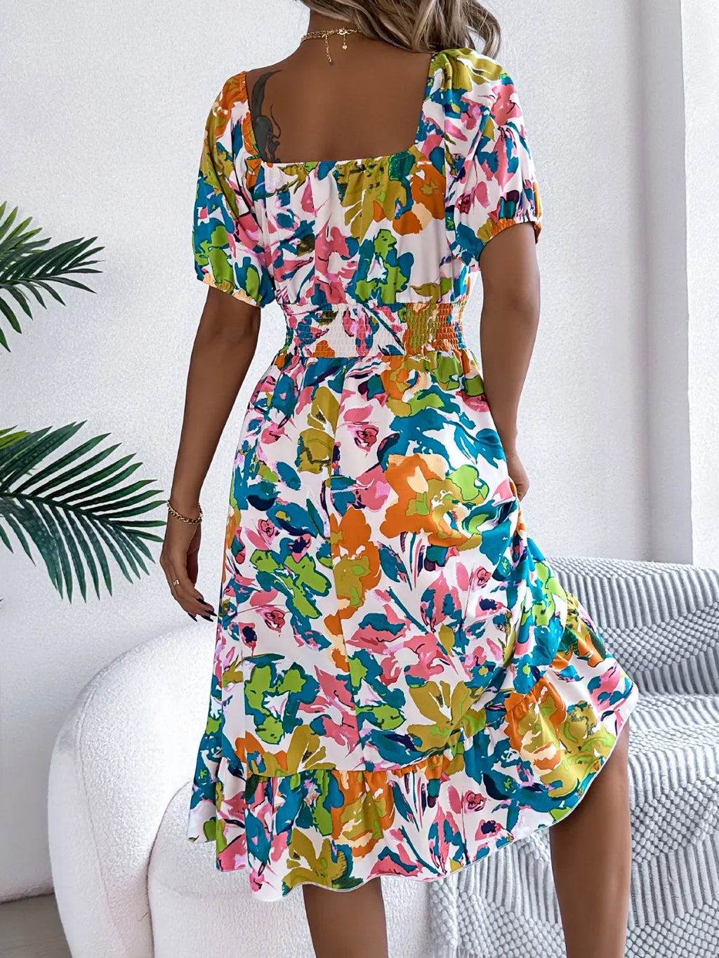Walking along a beach boardwalk in the floral midi dress

