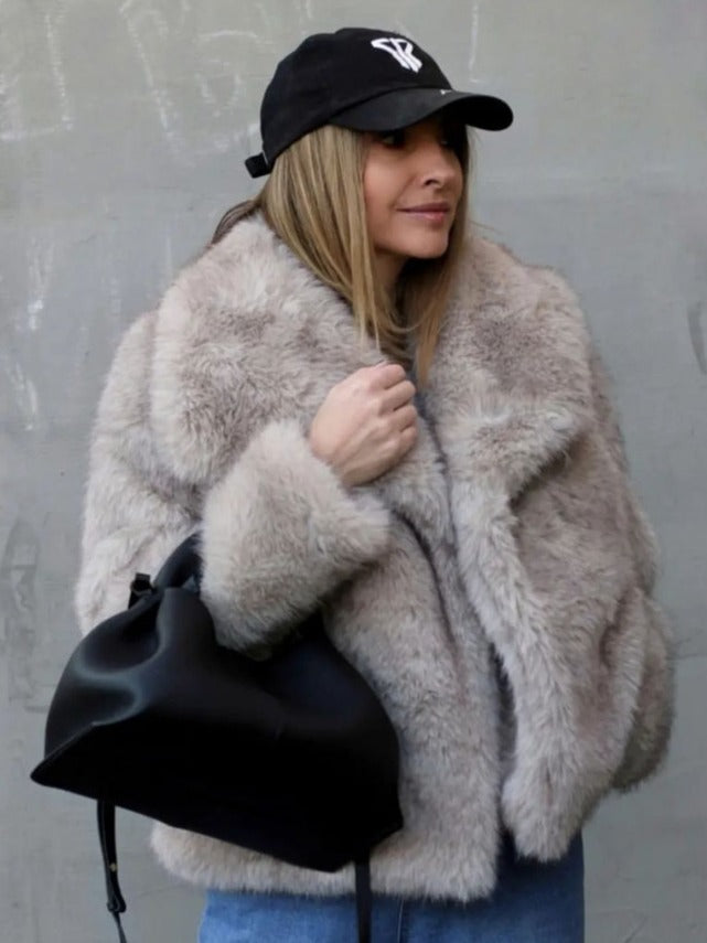 Winter Plush Coat pocket detail – soft lining, secure carry