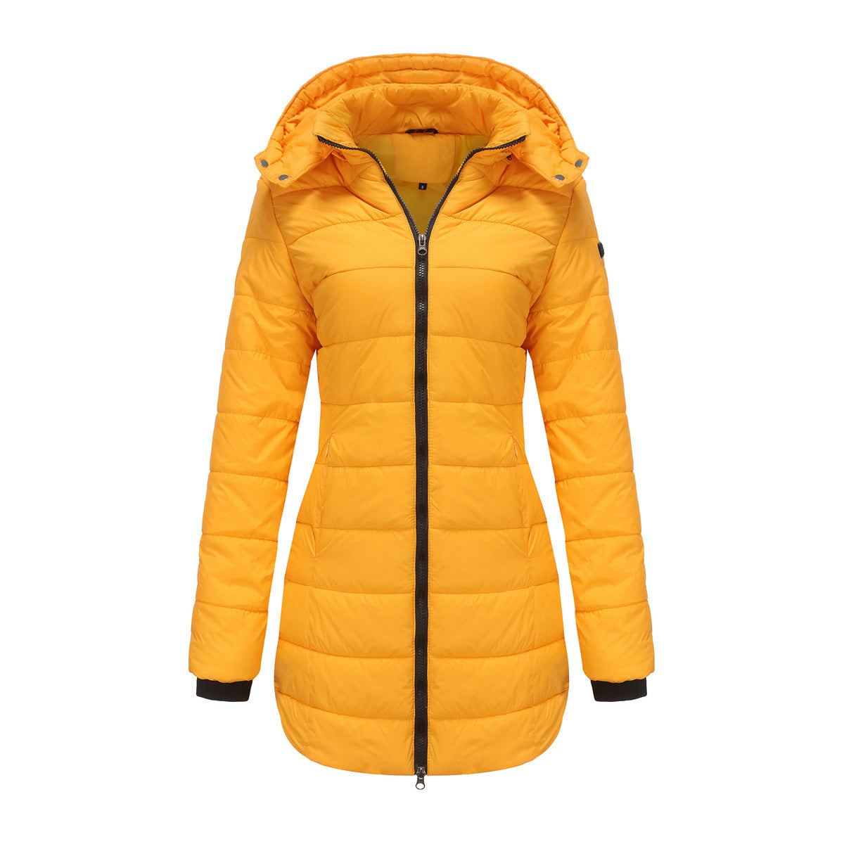 Woman in waterproof cotton-padded jacket standing on a modern city rooftop with skyline view

